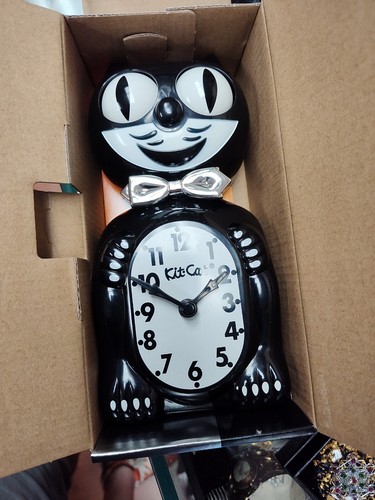 Black tuxedo kit kat clock - black,